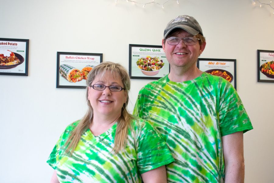 Co-owners Stacey Lasher and Carl Bauer pose for a portrait in their downtown GRAZERs location. The name GRAZERS comes from the fact that "grazing is the healthiest way to eat."