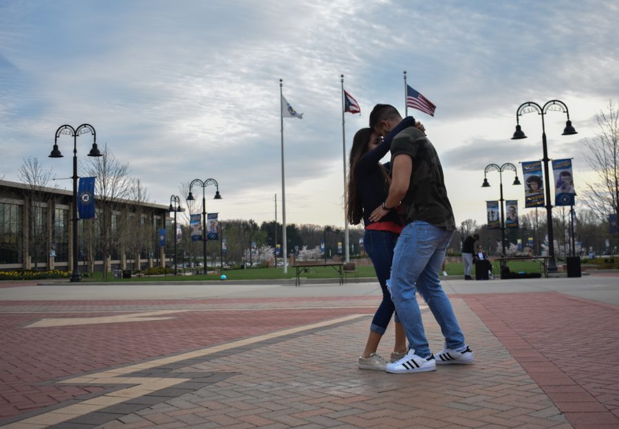 Waleed Siddiqe, a senior aeronautics major and Jessica Lopez, a senior nutrition major dance together on the K at the Festival Latino on Thursday, April 18, 2019.