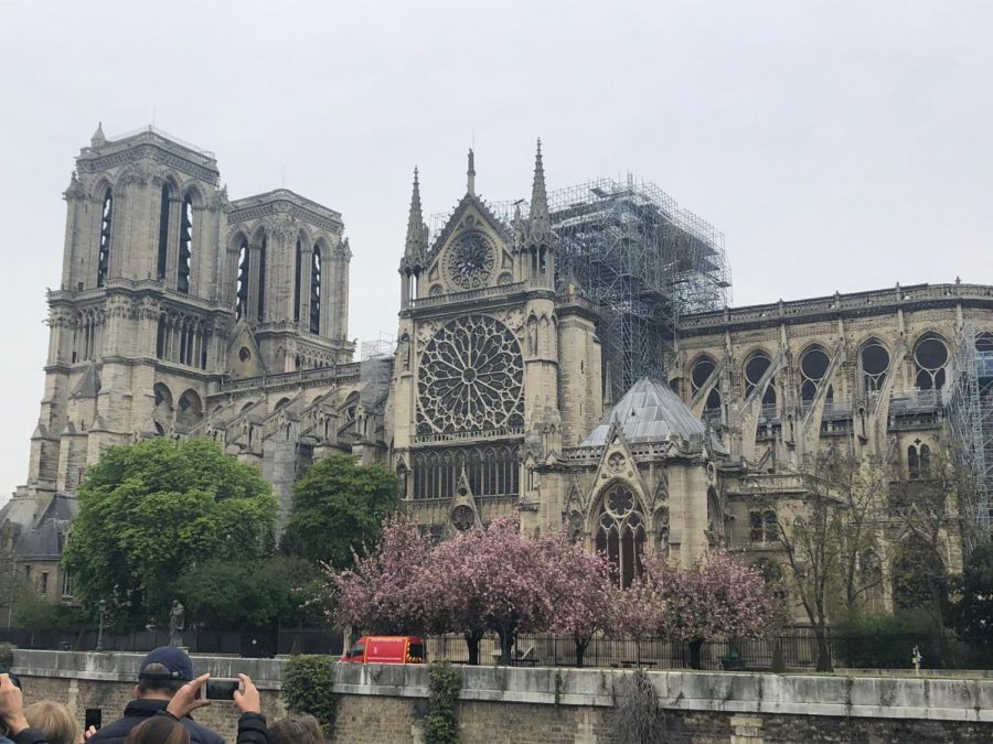 The damaged Notre Dame cathedral still stands after a devastating fire from the previous day.