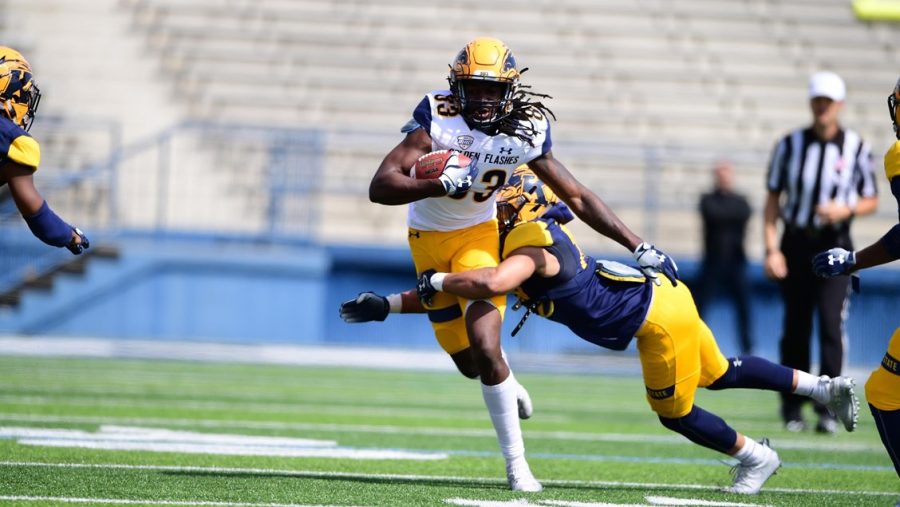 Running back Jo-El Shaw cuts back during the KSU spring game at Dix Stadium. April 13, 2019.