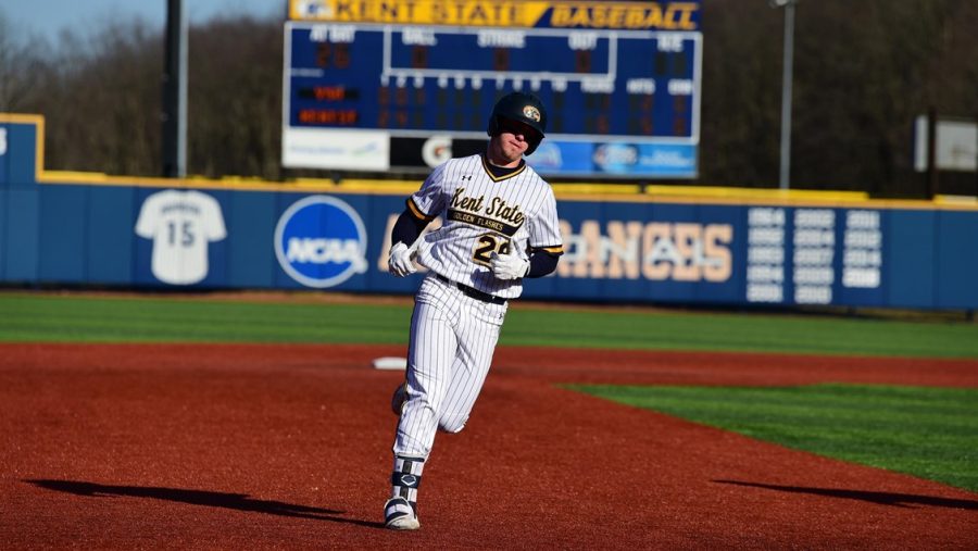 Senior Pavin Parks rounds the bases after hitting at home run. 