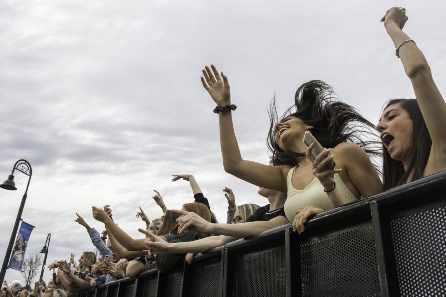 Students cheer in front of the outdoor stage at FlashFest on Thursday, April 11, 2019.