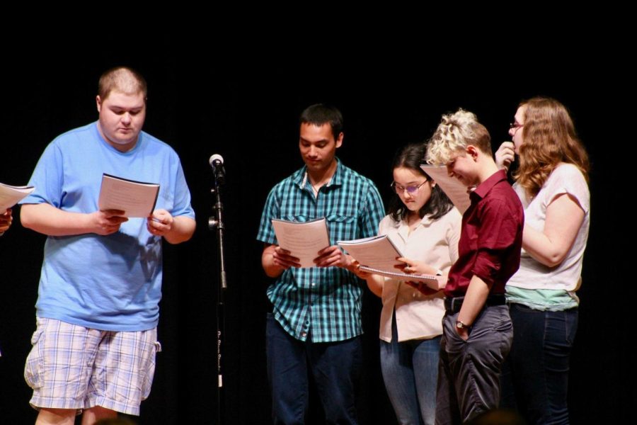 Students from the "Teaching Poetry in the Schools" course, taught by Charles Malone, perform at the Wick Poetry Center's annual Giving Voice event Thursday, May 2, 2019.