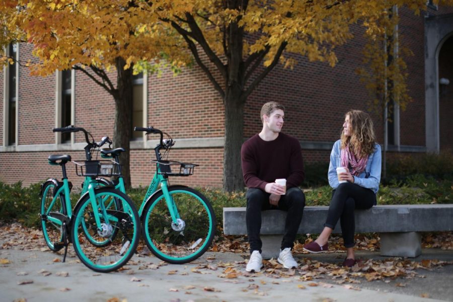 Promotional picture from the VeoRide website that shows actors and model bikes. 