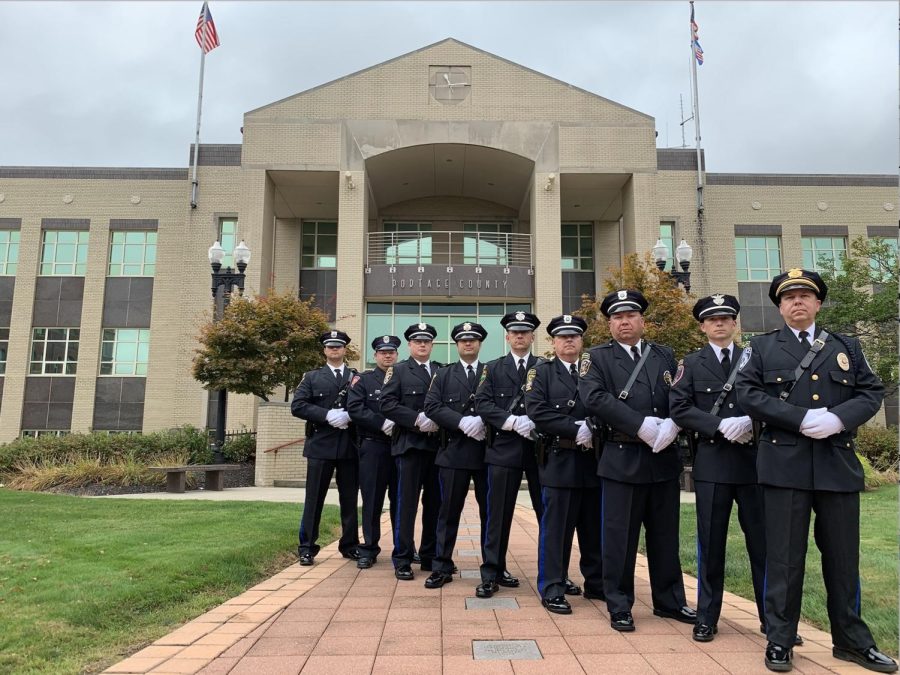 From left: Officer Matt Plesz, Streetsboro; Patrolman Jim Brown, Hiram; Officer Christopher Dynys, Garrettsville; Officer Joe Knotek, Kent State University; Officer Matt Butcher, Kent; Patrolman Marty Toukonen, Mantua; Officer Aaron Coates, Streetsboro; Officer Robert Putnam, Brimfield; Sgt. Shawn Parker, NEOMED. 