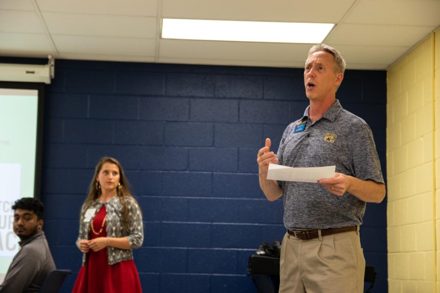 Scott Dotterer, Office of Health Promotion Coordinator, speaks in front of a group of freshman during an Alcohol Awareness workshop on Monday.  