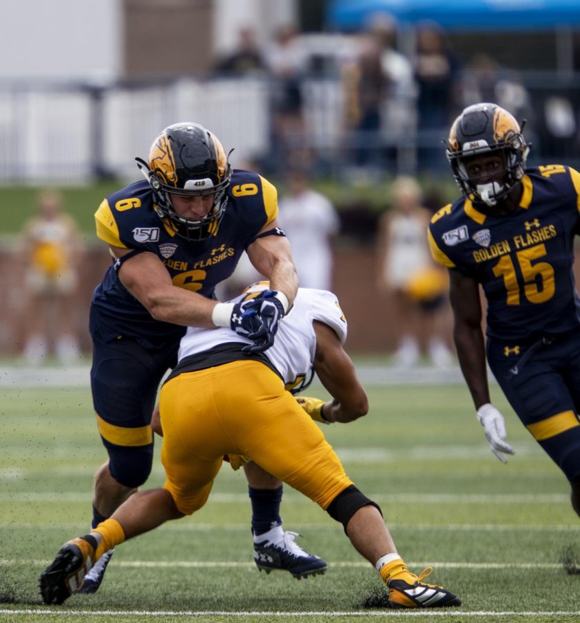 Graduate linebacker Matt Bahr tackles a Kennesaw State University player in Kent State's first home game on Saturday, September 7, 2019. The Flashes beat Kennesaw State 26-23 in overtime.