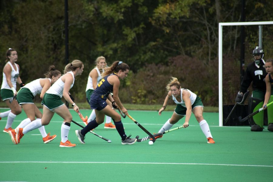 Clara Rodriguez Seto, number 26, attempts to score during the field hockey game against Ohio University.