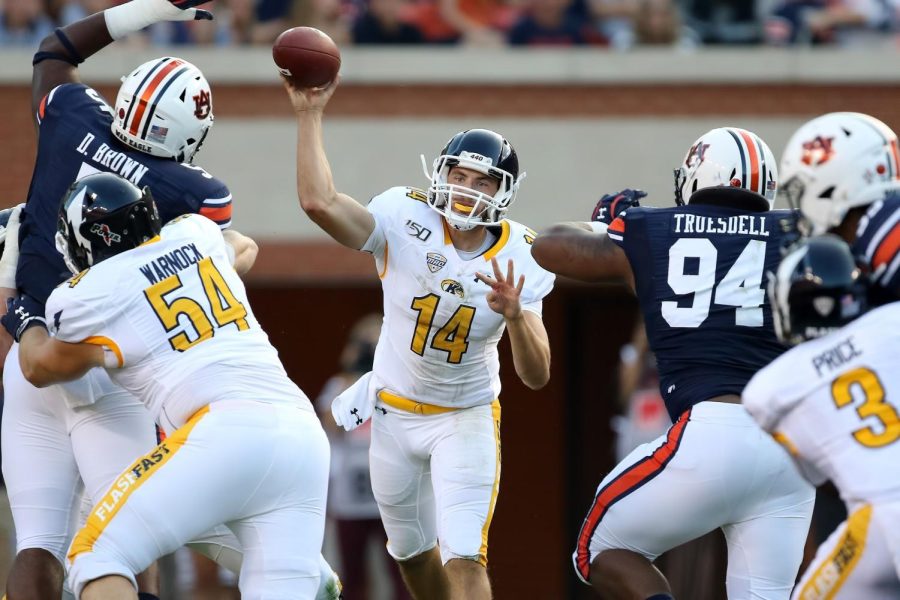 Dustin Crum attempts a pass during Saturday's 55-16 loss at No. 8 Auburn. Crum finished with a career-high 198 passing yards.