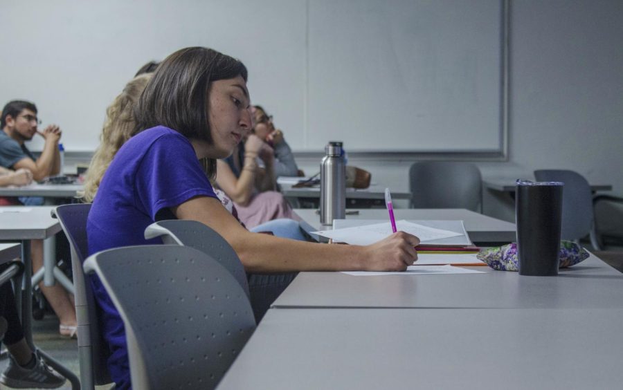 A student is taking notes at the Active Minds meeting on September 10, 2019. The largest group of students made an appearance at the first meeting of the new school year to participate in the National Suicide Prevention day stimulation.