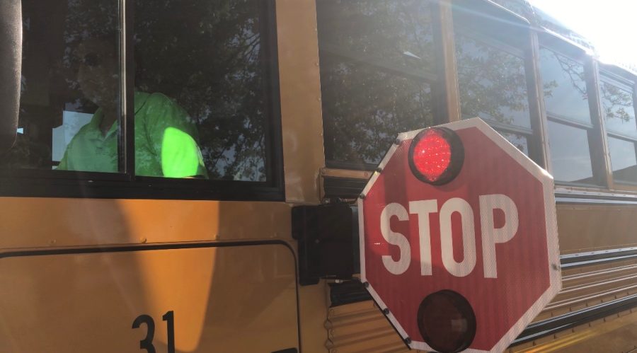 Cars illegally passing stopped school busses in Kent