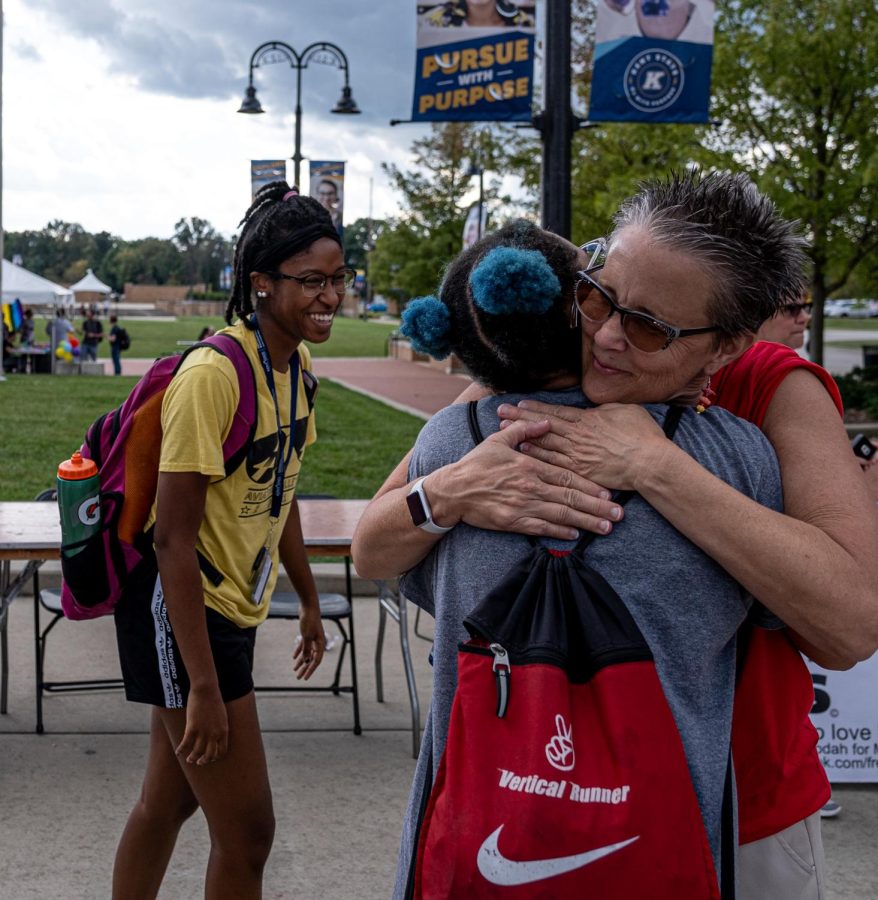 Diana Boggs hugs sophomore teaching English as a second language major Jordan Boysaw while junior fashion design major Angela Ruffin looks on and smiles at Kent State's Rainbow Squirrel Festival in Risman Plaza on Thursday, Oct. 3, 2019. Boggs was a representative of Free Mom Hugs, an LGBTQ+ ally group.