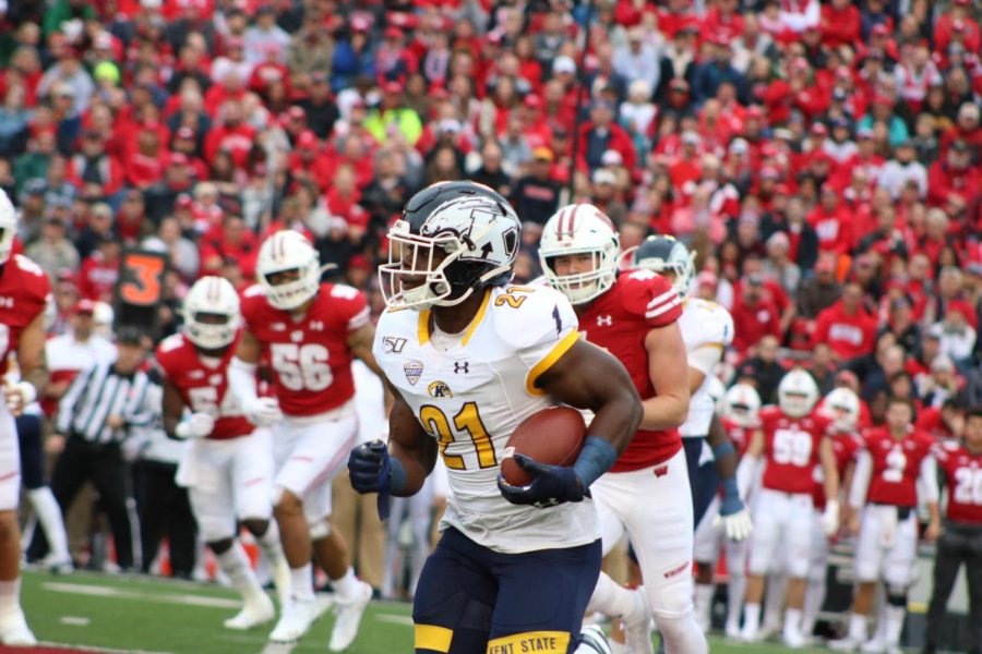 Freshman running back Joachim Bangda runs the ball during Saturday's 48-0 loss to Wisconsin. He finished with eight carries for 32 yards.