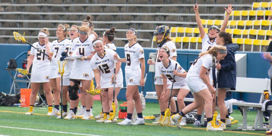 Members of the Kent State women's lacrosse team cheer after scoring a goal against Kennesaw State on April 11, 2019. Kent lost 11-18.