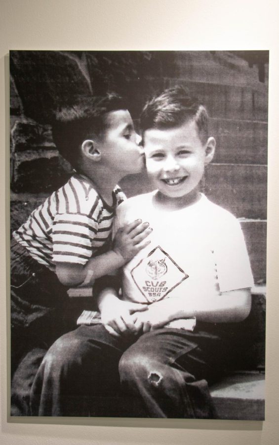 An old family photo displayed of Jeffrey Miller and his older brother Russell playing together as children in the "Our Brother Jeff" exhibit at the May 4 Visitors Center on Nov. 14, 2019.