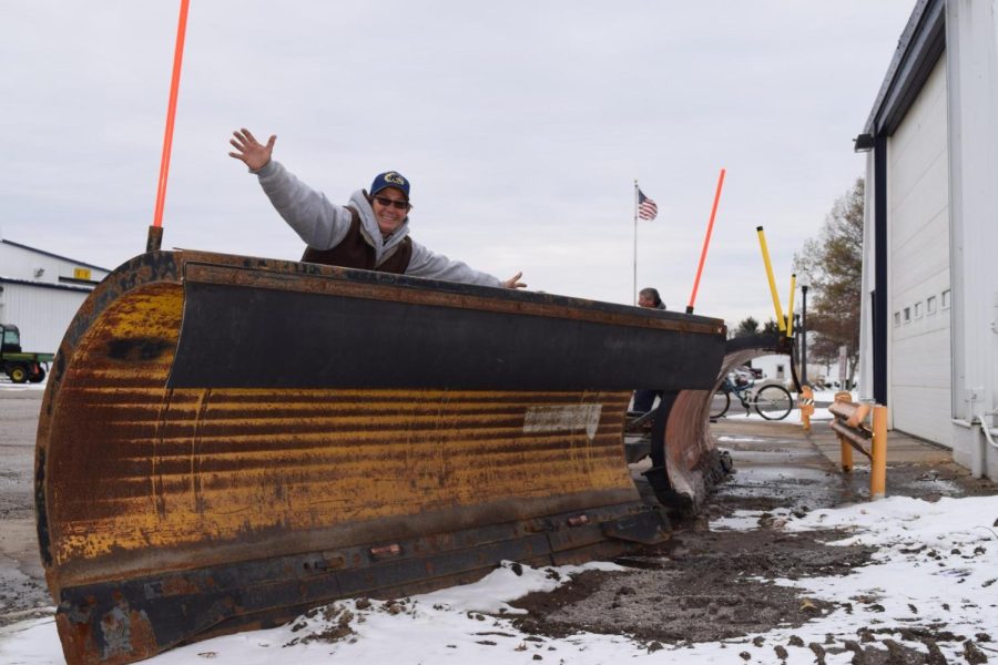 Groundskeeper Jil Morgan poses with a plow.