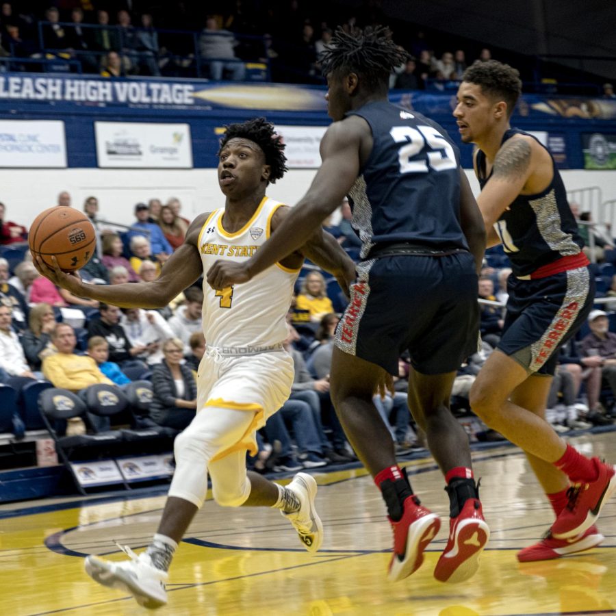 Antonio "Booman" Williams, senior guard, drives the ball towards the hoop during Kent State's game against Hiram College on Wednesday, November 6, 2019.