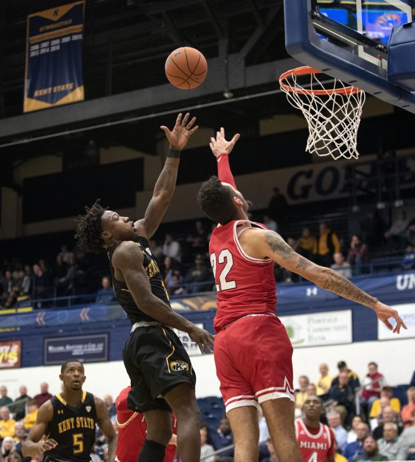 Senior guard Antonio “Booman” Williams (4) makes a layup to give Kent State a 29-24 lead against Miami University midway through the first half on Feb. 25, 2020. Kent State won 74-61 and Williams scored a game-high of 17 points.