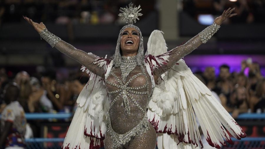 Drum queen Gracyanne Barbosa from the Uniao da Ilha samba school performs during Carnival celebrations at the Sambadrome in Rio de Janeiro, Brazil, Monday, Feb. 24, 2020.