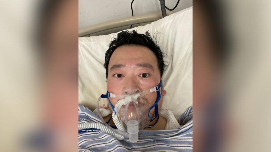 Wuhan doctor Li Wenliang lies in an intensive care bed on oxygen support in the hospital. Wenliang contracted the coronavirus after treating a patient whom he didn't know was infected.