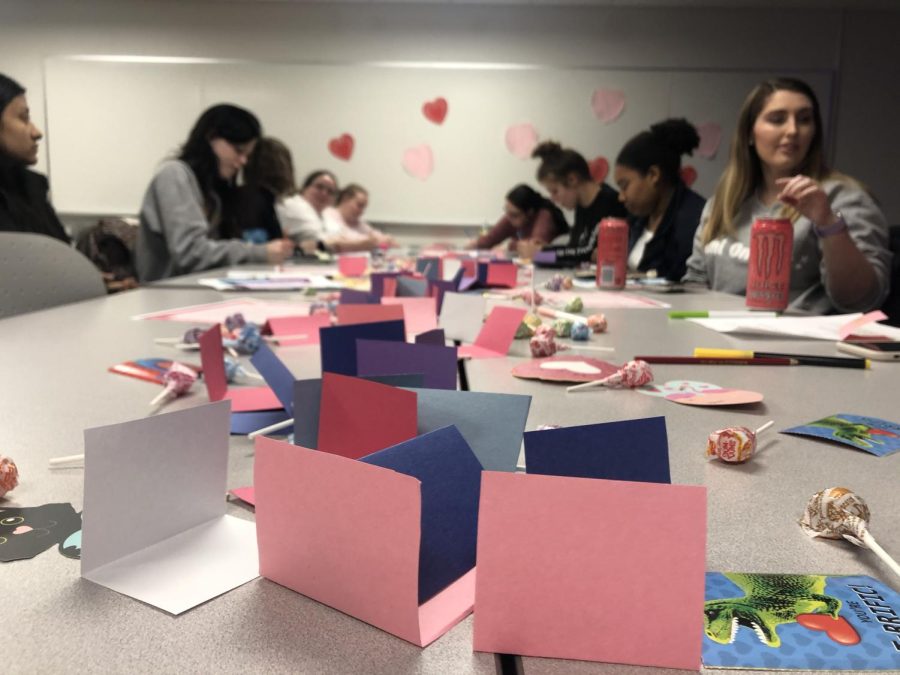 Students gather to socialize and make candy grams for Valentine’s Day Feb. 10, 2020.