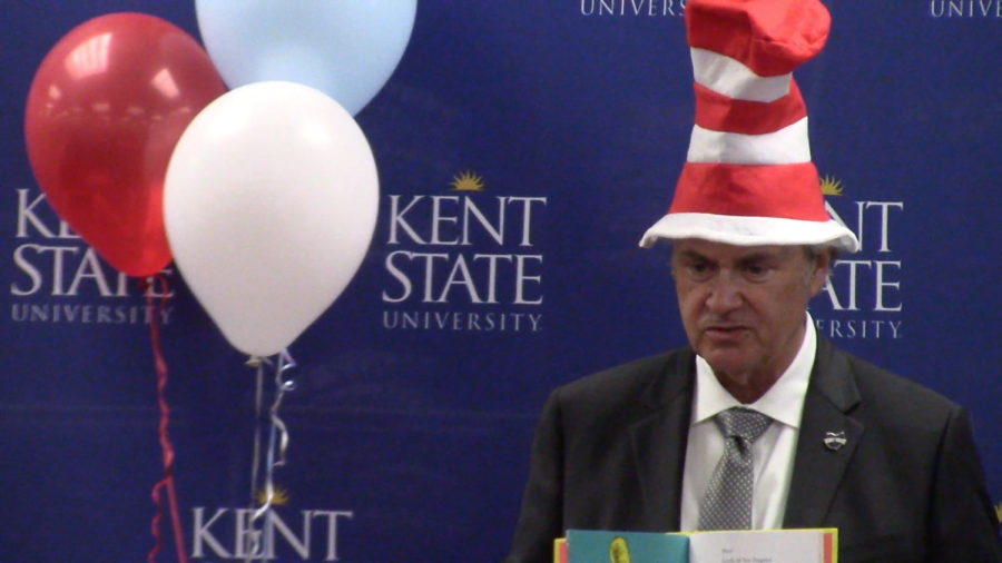 KSU president, Todd Diacon, reads to kids in the Child Development Center. 