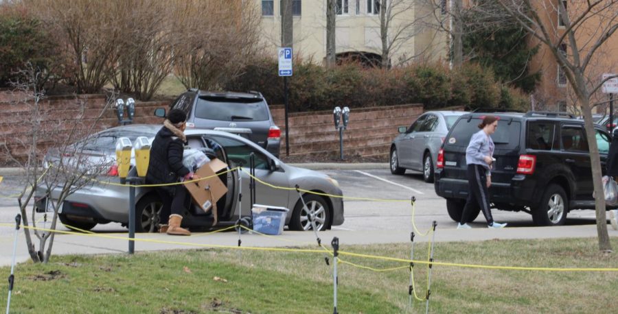 Students pack up their cars and leave the dorm to go home because of the cancellation of face-to-face classes at Kent State. Classes will be held online until April 13. 