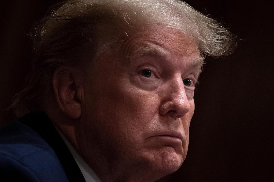 President Donald Trump listens during a meeting on Opportunity Zones in the Cabinet room of the White House May 18, 2020, in Washington, DC.