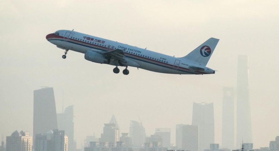 A plane from Chinese airline China Eastern departs from Hongqiaou Airport in Shanghai on February 8, 2015.