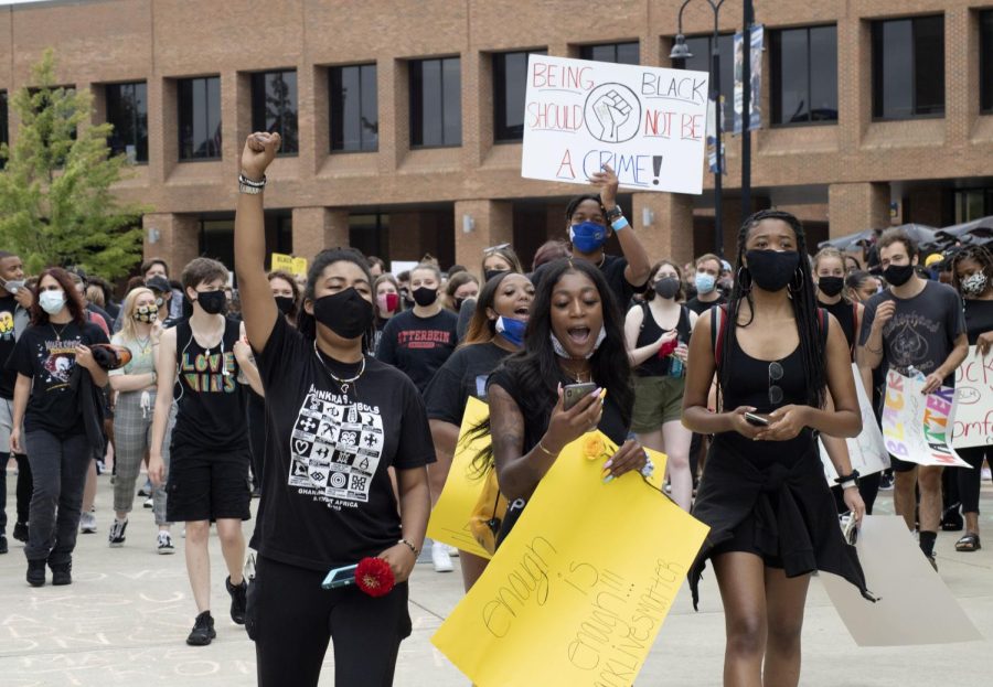 Protesters start to walk toward Oscar Richie Hall and then down to the rock during the Black Lives Matter protest on Sept. 10, 2020.