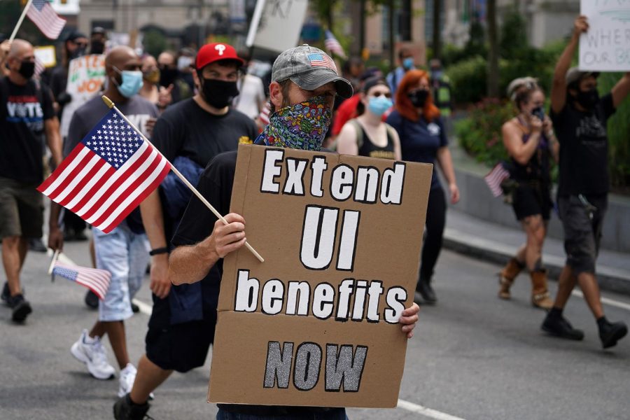 Workers from the entertainment industry hit hard by the COVID-19 pandemic participate in a March for Awareness, organized by the International Alliance of Theatrical Stage Employees. America's jobs recovery is expected to have slowed further in August as the services sector continues to struggle.