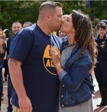 Krystin and Adam Fletcher after getting engaged at Kiss on the K in 2016. 