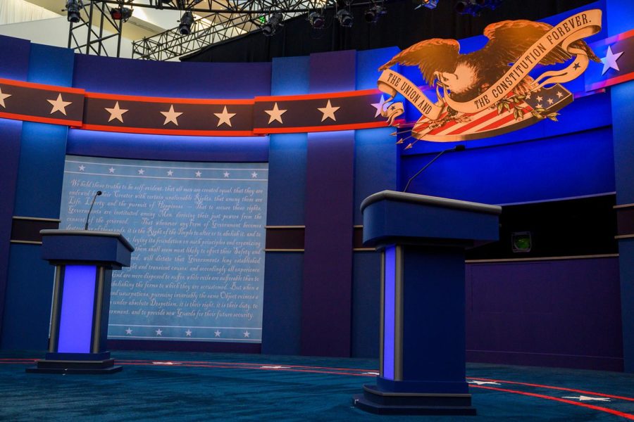 The empty stage of the first US Presidential debate is seen as workers complete the final touches on September 29,2020 in Cleveland, Ohio. - Tuesday's clash in Cleveland, Ohio, the first of three 90-minute debates, represents the first time voters will have the chance to see the candidates facing off against one another directly.