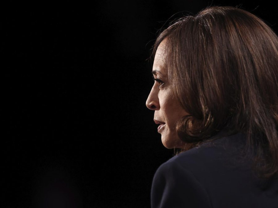 FILE - In this Oct. 7, 2020, file photo, Democratic vice presidential candidate Sen. Kamala Harris, D-Calif., listens during the vice presidential debate at Kingsbury Hall on the campus of the University of Utah in Salt Lake City. Harris made history Saturday, Nov. 7, as the first Black woman elected as vice president of the United States, shattering barriers that have kept men — almost all of them white — entrenched at the highest levels of American politics for more than two centuries. (Justin Sullivan/Pool via AP, File)