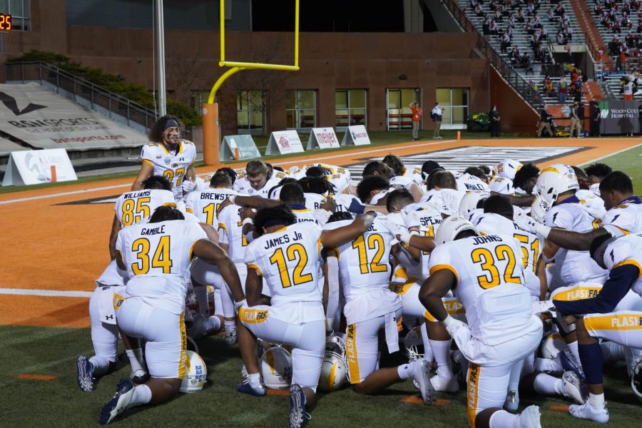 Kent State players gather in the end zone before their game against Bowling Green. Kent State would win in dominant fashion, 62-24. Nov. 10, 2020. Photo courtesy of BGSU Athletics.