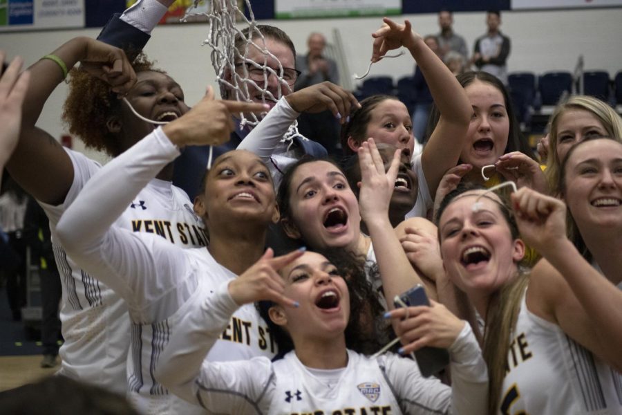 The Kent State women's basketball team celebrates their win against Ohio University to clinch the MAC East Conference regular season championship. Mar. 4, 2020. 