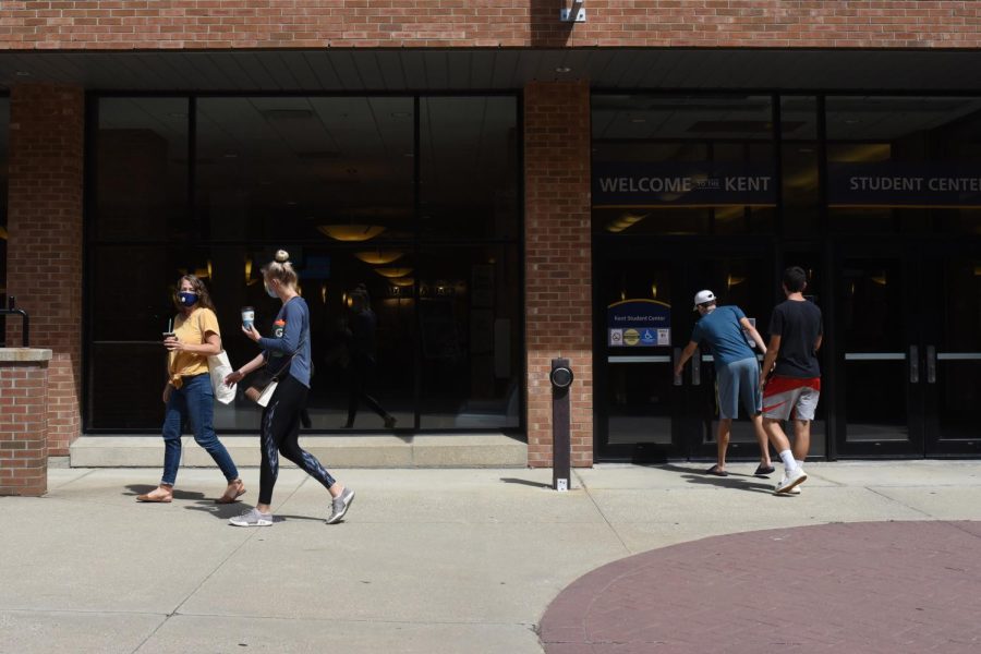 Students walking on Kent State's campus. 