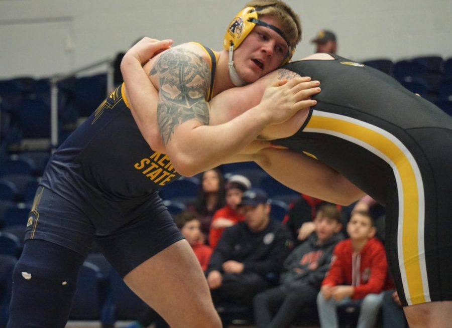 Sophomore Spencer Berthold grapples with Missouri's Jacob Bohlken in the heavyweight division at the M.A.C.C. Sunday, Jan. 19, 2020. Berthold fought back at the end of the final period to force overtime, but was unable to get the victory. 