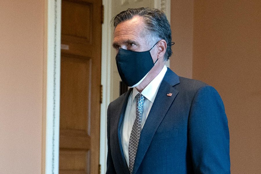 WASHINGTON, DC - OCTOBER 20: U.S. Sen. Mitt Romney (R-UT) walks to the Senate floor on Capitol Hill on October 20, 2020 in Washington, DC. 