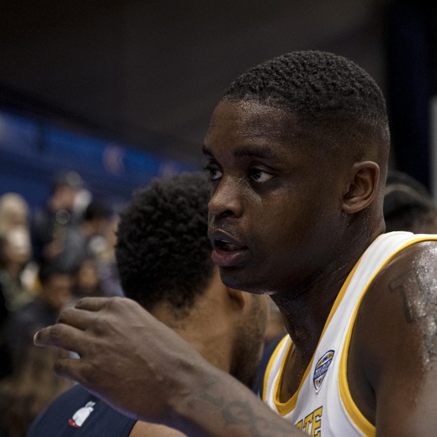 Kalin Bennett hugs a Hiram player after Kent State defeated Hiram College 97-58 on November 6, 2019.