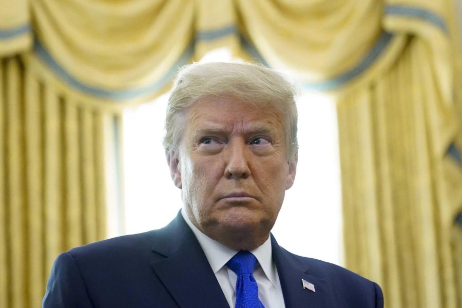 In this Dec. 7, 2020 photo President Donald Trump in the Oval Office of the White House in Washington. 