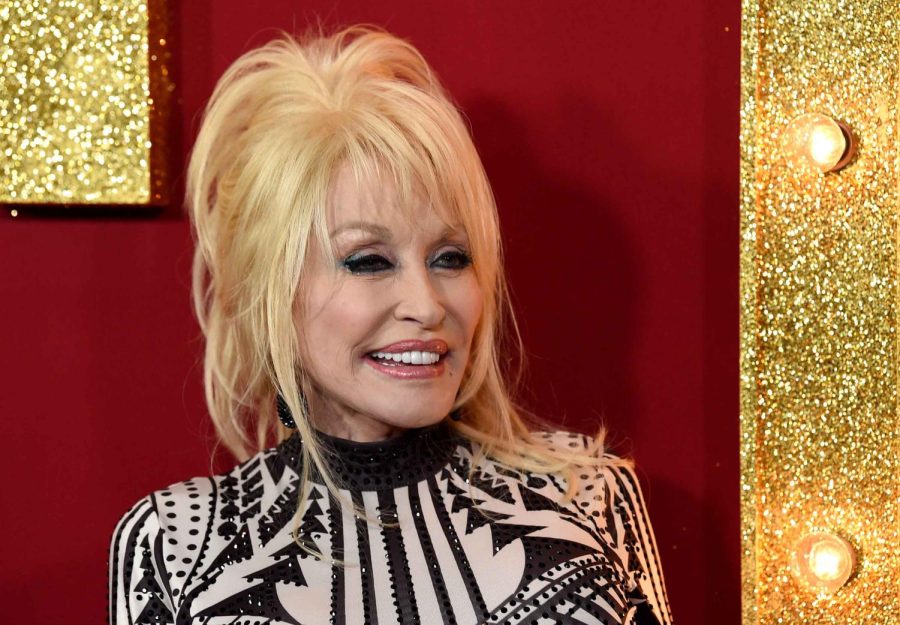 LOS ANGELES, CA - DECEMBER 06: Dolly Parton arrives at the premiere of Netflix's "Dumplin'" at the Chinese Theater on December 6, 2018 in Los Angeles, California. (Photo by Kevin Winter/Getty Images)