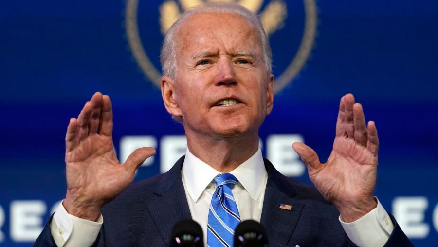 In this Jan. 14, 2021 photo, President-elect Joe Biden speaks during an event at The Queen theater, in Wilmington, Del. (AP Photo/Matt Slocum)