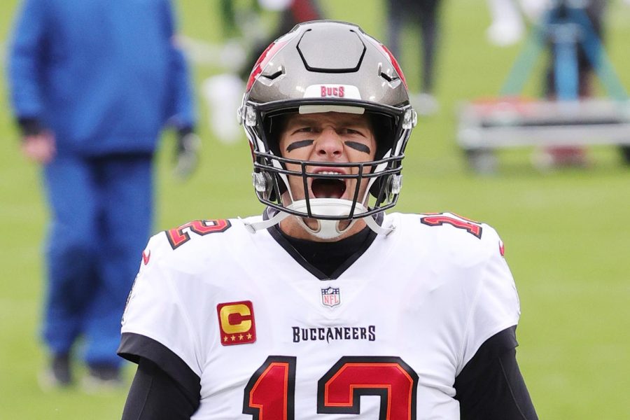 Tom Brady #12 of the Tampa Bay Buccaneers warms up prior to their NFC Championship game against the Green Bay Packers at Lambeau Field on January 24, 2021 in Green Bay, Wisconsin.