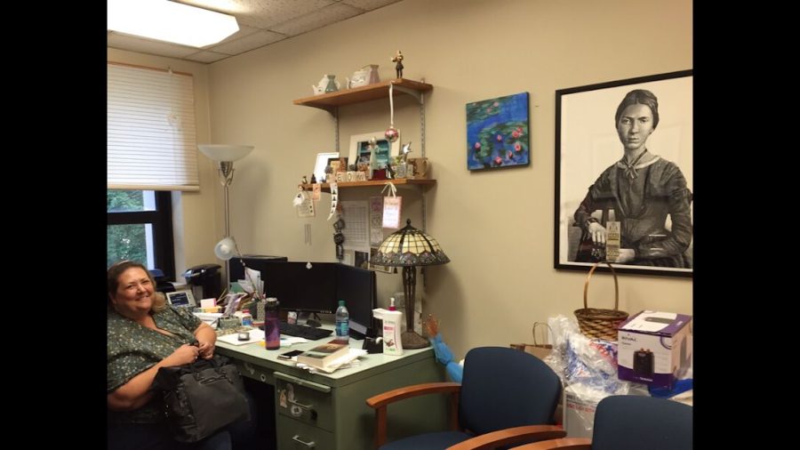 A portrait of a pensive Emily Dickinson hung on the wall of Winebrenner’s office. Winebrenner was preparing to teach a seminar on Emily Dickinson in Spring 2021. 