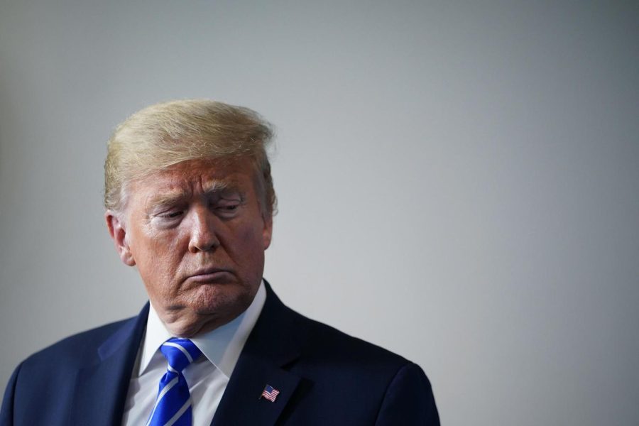 TOPSHOT - US President Donald Trump listens to a speaker during the daily briefing on the novel coronavirus, which causes COVID-19, in the Brady Briefing Room of the White House on April 23, 2020, in Washington, DC. (Photo by MANDEL NGAN / AFP) (Photo by MANDEL NGAN/AFP via Getty Images)