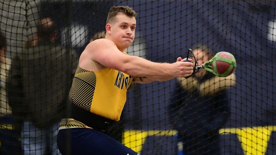 Jake Wickey competes in the weight throw in a tri-meet against Akron and Buffalo at the Stille Fieldhouse in Akron. Jan. 22, 2021.