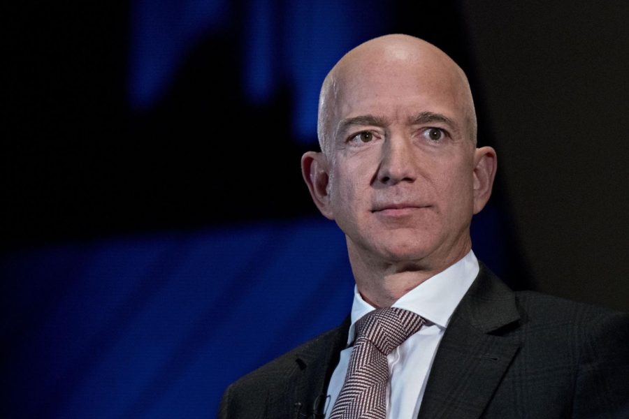 Jeff Bezos, founder and chief executive officer of Amazon.com Inc., listens during an Economic Club of Washington discussion in Washington, D.C., U.S., on Thursday, Sept. 13, 2018. 