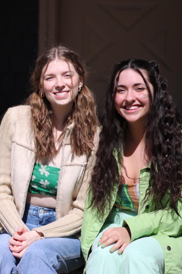 Sophia Fricioni poses with her roommate on their front porch. 