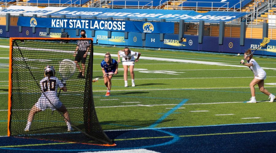 Taylor Monturo (00) prepares to take a free position shot against Presbyterian College. Monday, March 22, 2021.